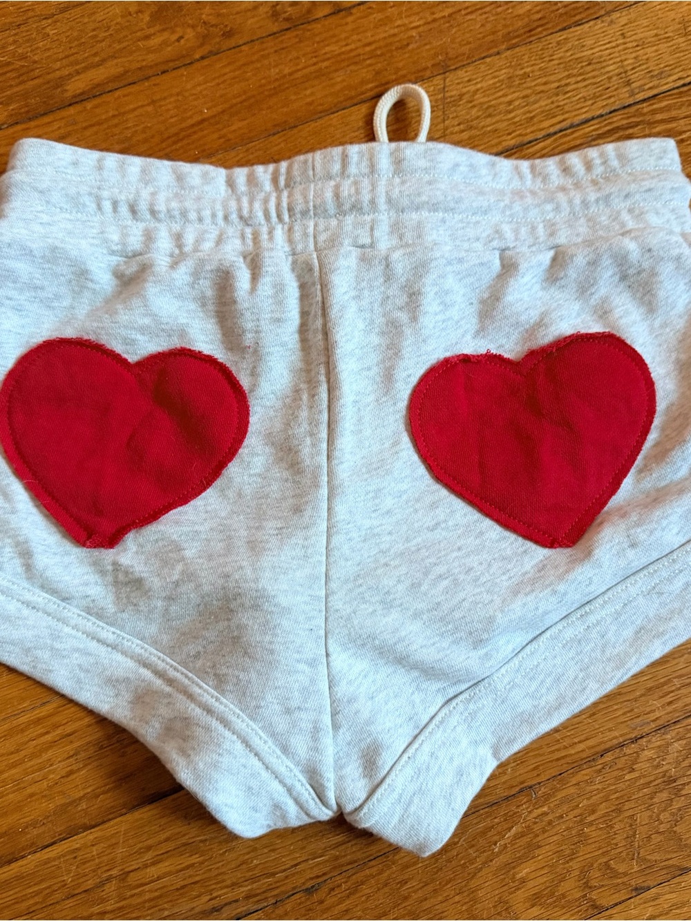 Urban Outfitters Kids Shorts with Red Heart Patches on Light Gray